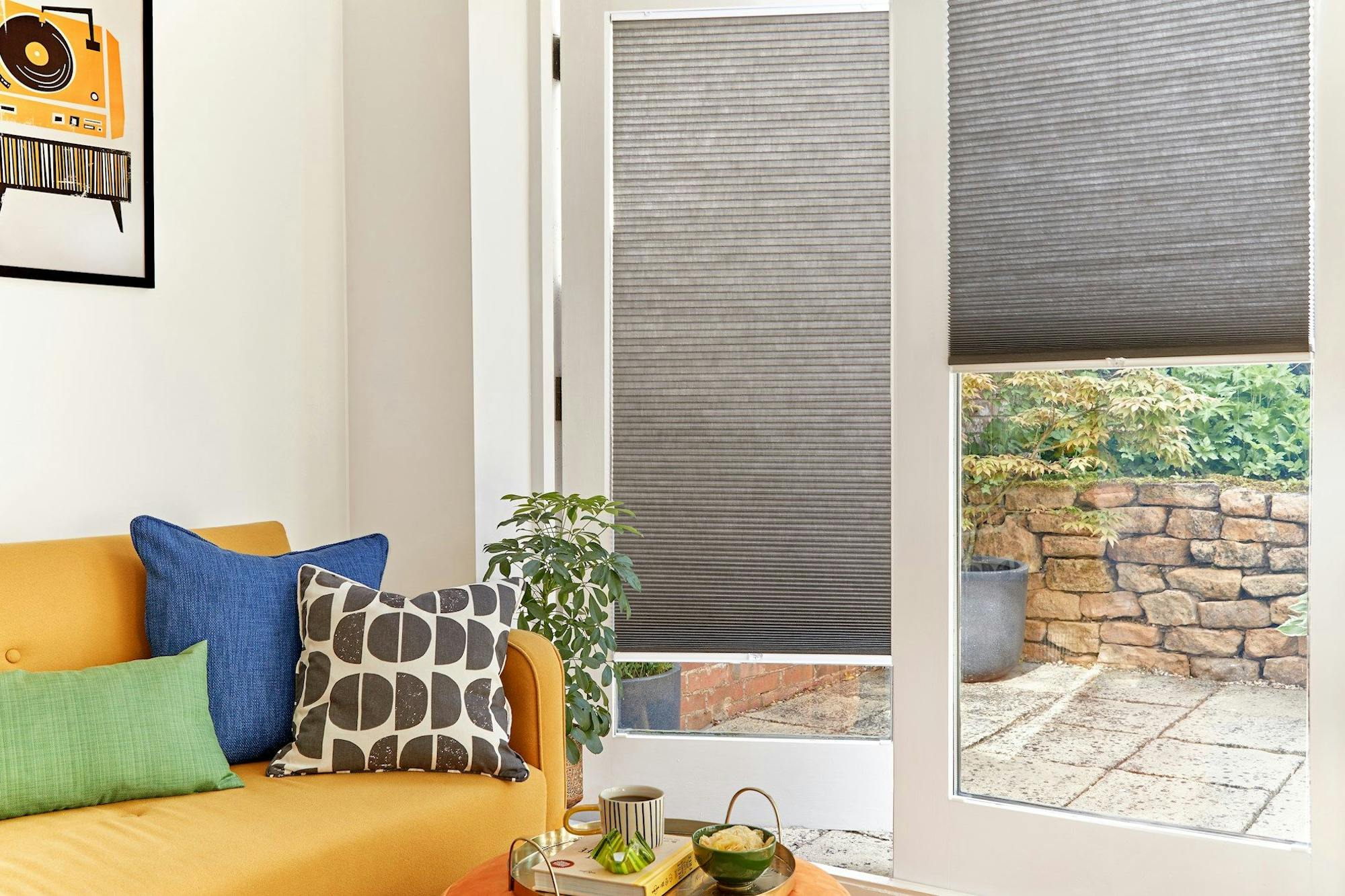 duette charcoal pleated blinds on french doors in living room