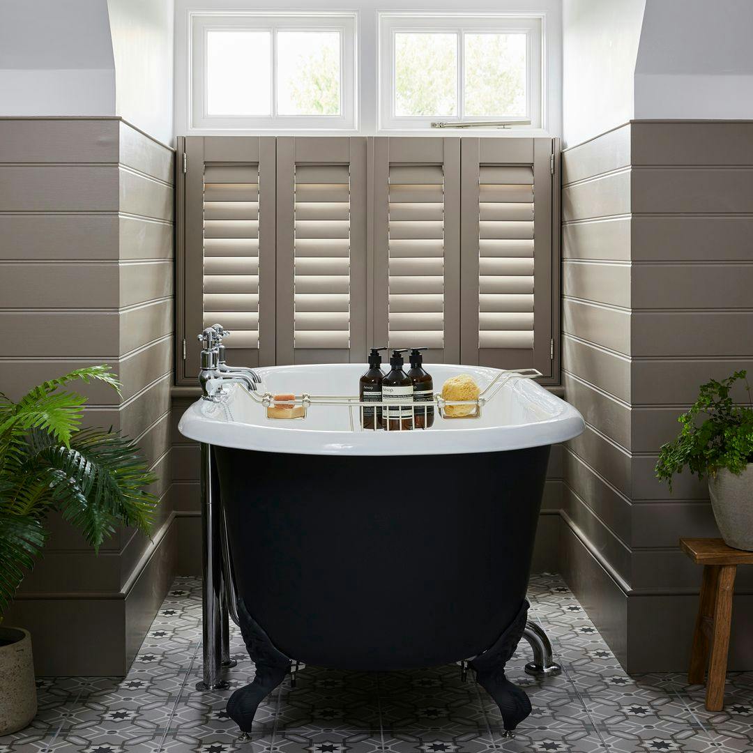 anna richardson brown grey cafe shutters on window in bathroom behind bath