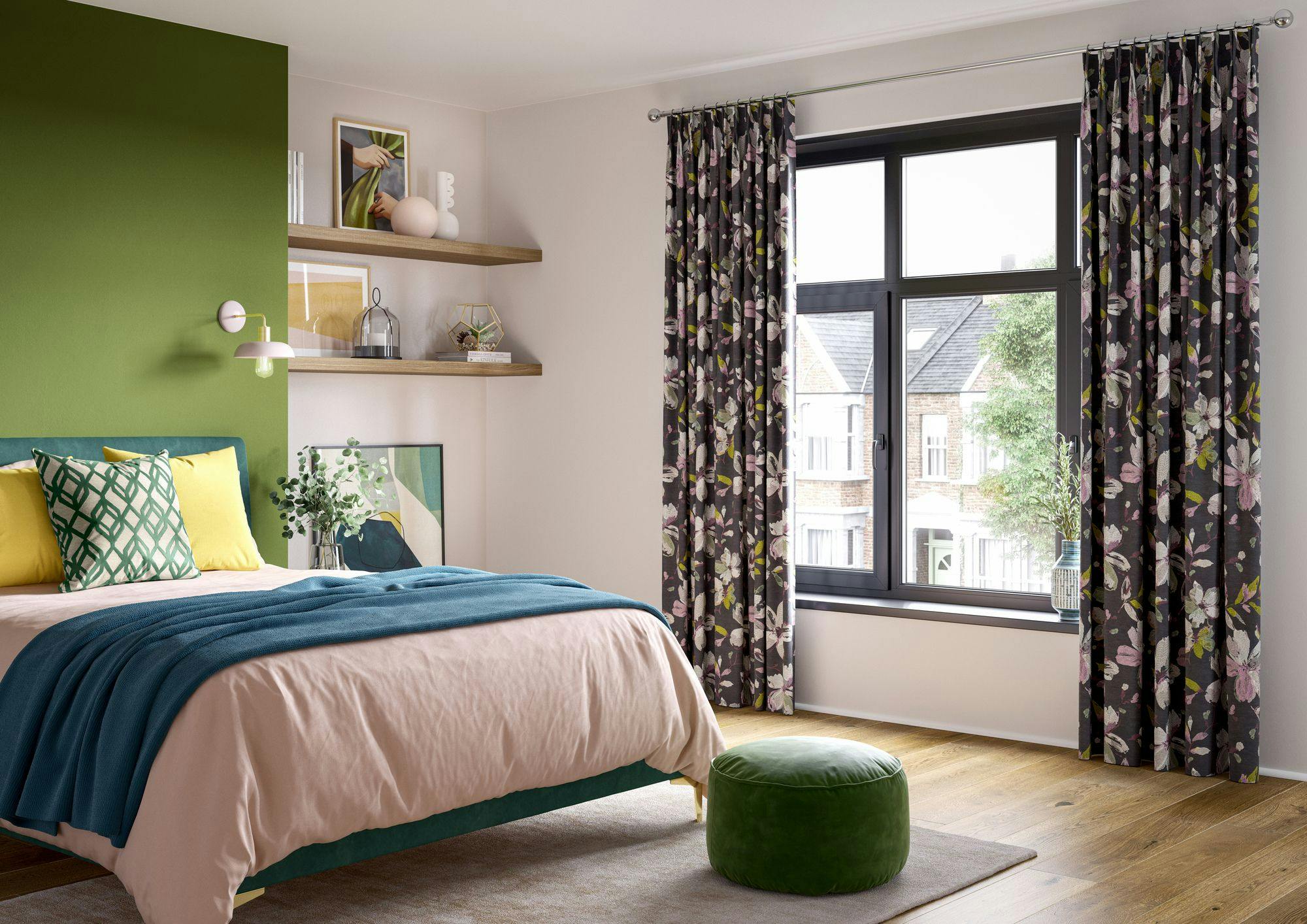 A neatly made bed with green and yellow pillows stands against a green wall. Nearby, decorated shelves and floral curtains frame a window overlooking suburban houses.
