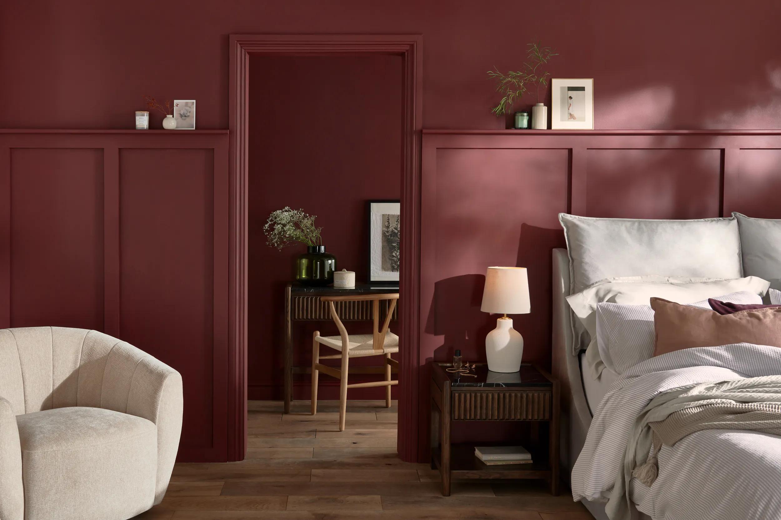 Stylish burgundy painted bedroom
