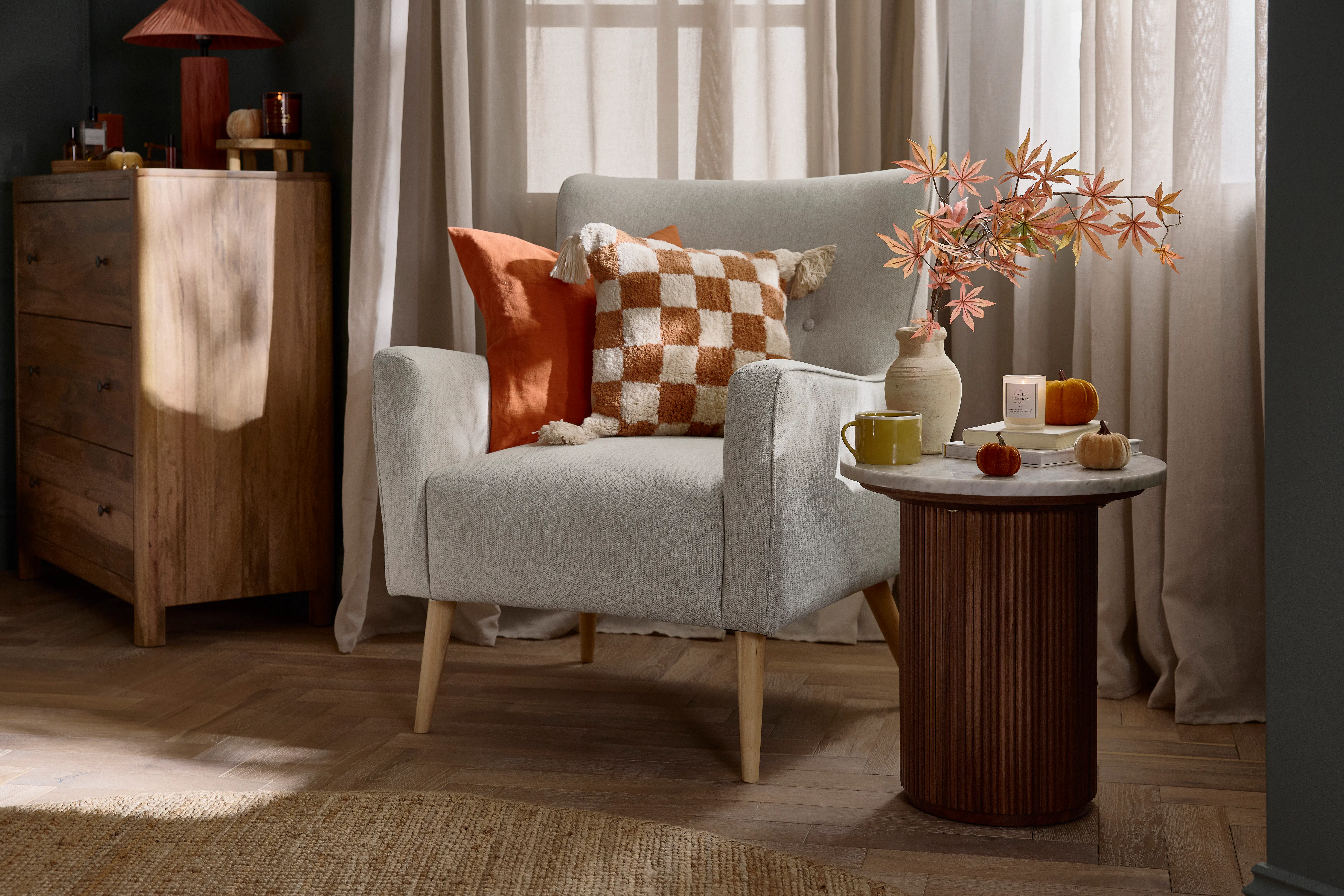 Oak Furnitureland bedroom with Harris chair and Elba side table