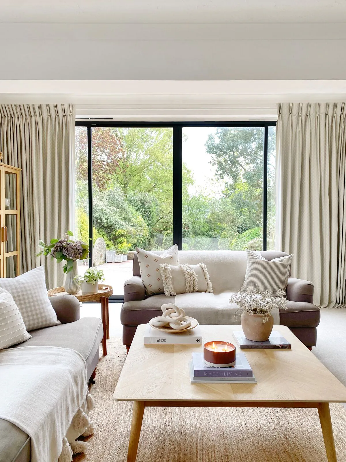 Layla stone floor length curtains on large patio doors in beige themed living room