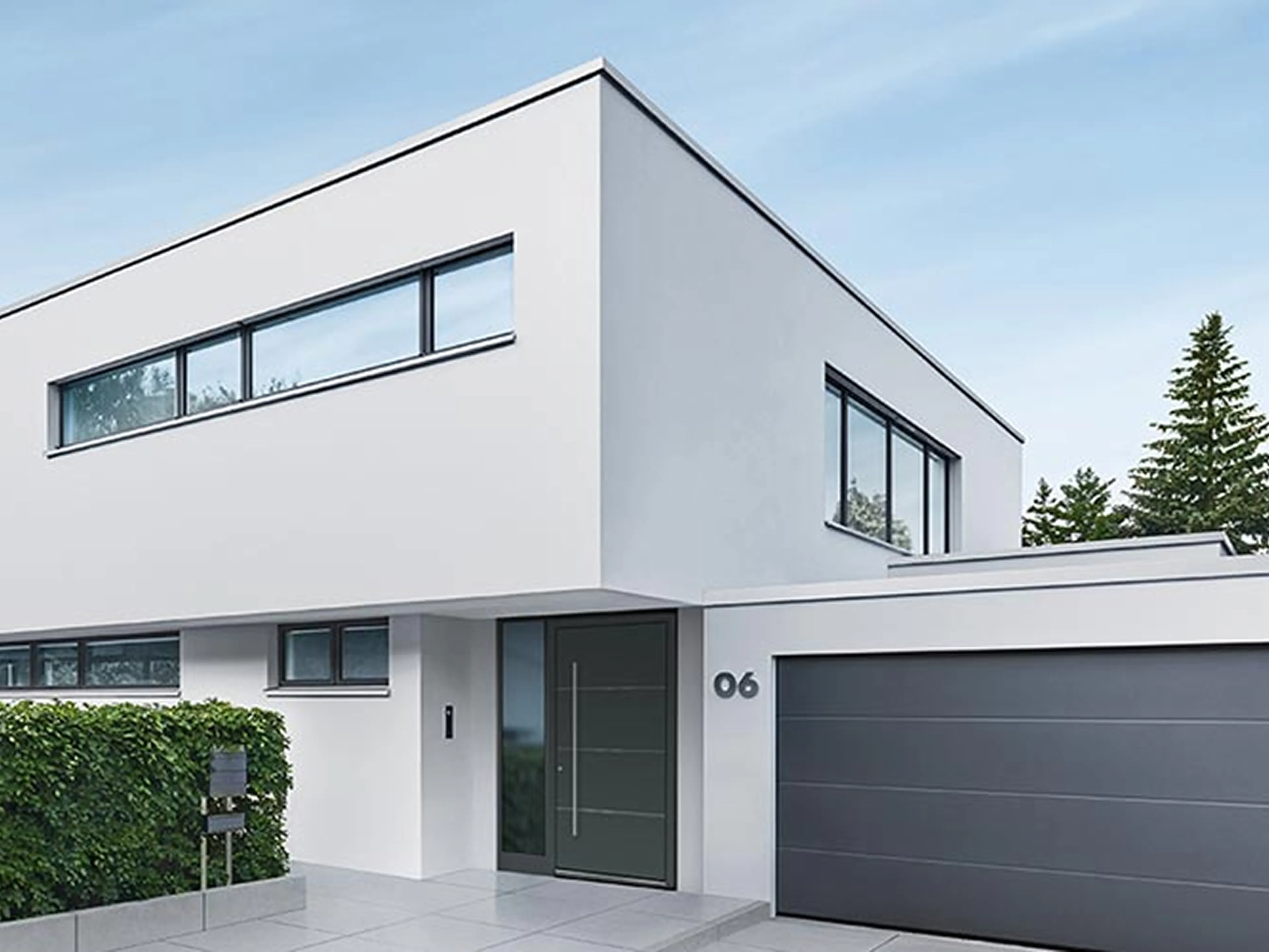 Modernes weißes Wohnhaus im Bauhaus-Stil mit anthrazitfarbener Haustür