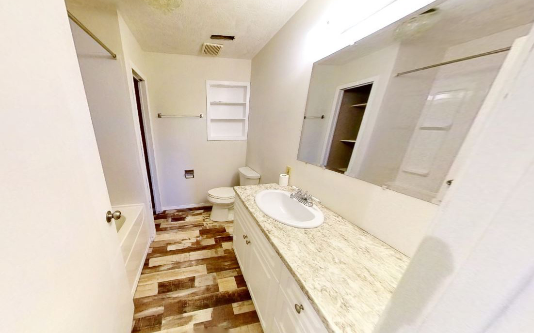 Unstaged downstairs bathroom from realtor imageset