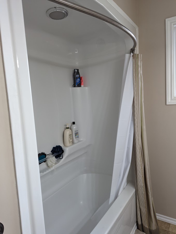 Bathroom with shower, pre-renovation