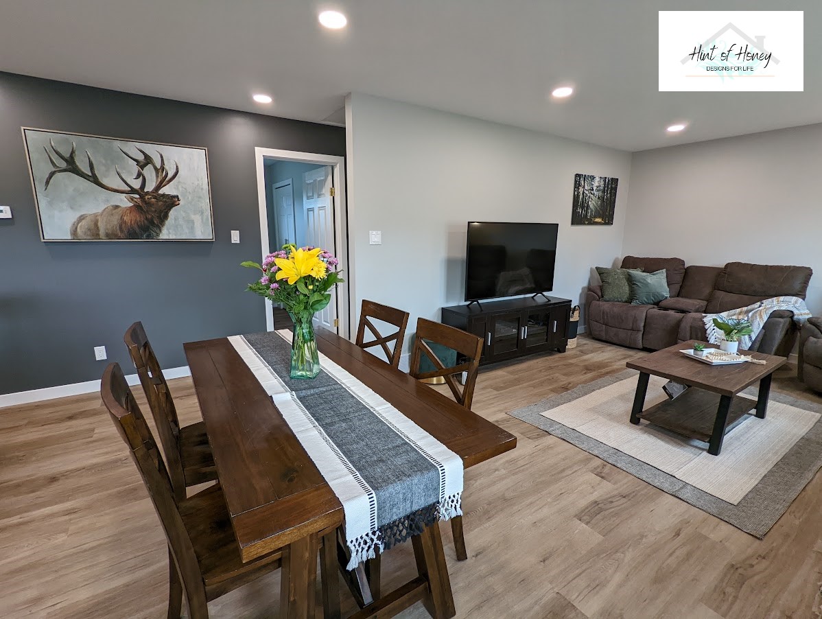 Staged dining room and living room, home staging by Hint of Honey