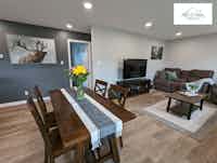 Staged dining room and living room, home staging by Hint of Honey