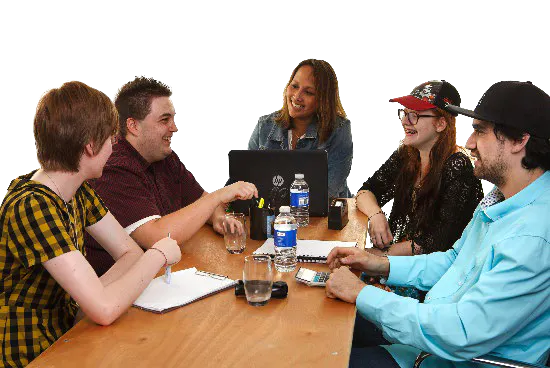 Several people in a workshop.