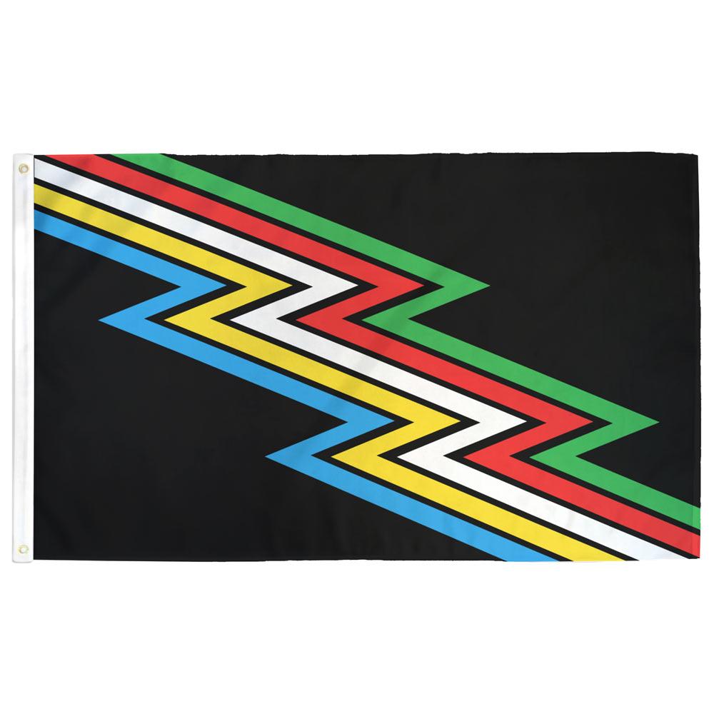A flag with a diagonal lightning bolt design on a black background. The zigzag pattern includes the colours blue, yellow, white, red and green stacked on top of one another.