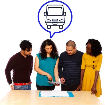 A group of people looking at a folder. They have made a decision together.