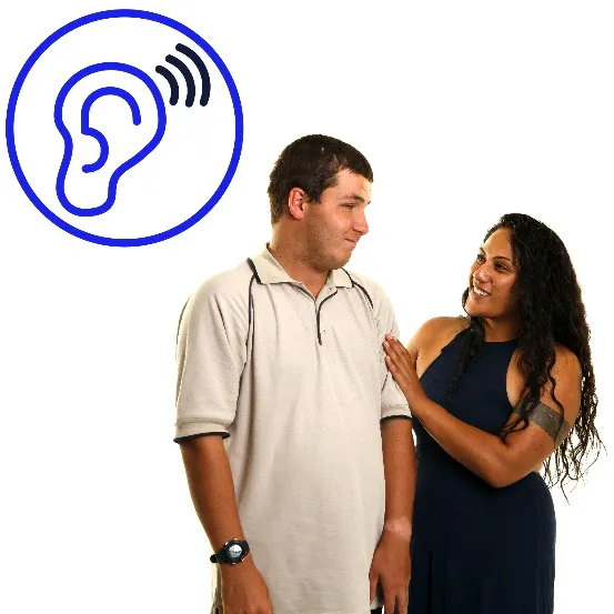 A woman listening to a man and supporting him. There is an icon above them showing an ear listening.