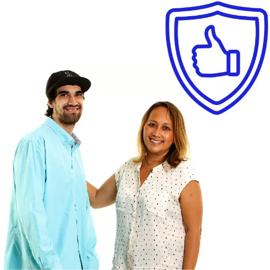 Two smiling people. One person is supporting the other. There is a safety icon above them.
