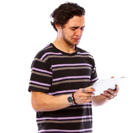 A man struggling to read a document