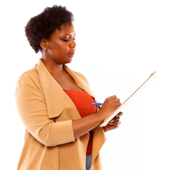 A woman writing on a clipboard