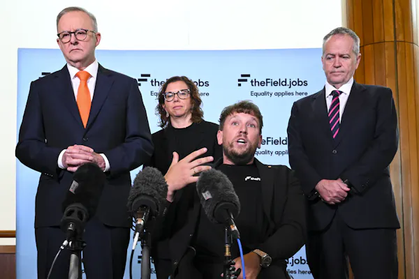 2022 Australian of the Year Dylan Alcott speaks to the media surrounded by Australian Prime Minister Anthony Albanese, Australian Minister for the National Disability Insurance Scheme Bill Shorten and Minister for Social Services Amanda Rishworth during the launch of disability employment website ‘The Field’, at Parliament House in Canberra, Wednesday, November 9, 2022.