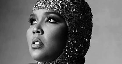 Lizzo's Special album cover features the American singer and rapper wearing a sequinned head cap, staring off to the right. The album cover is in black and white, and features the title, 'Special', across the top.