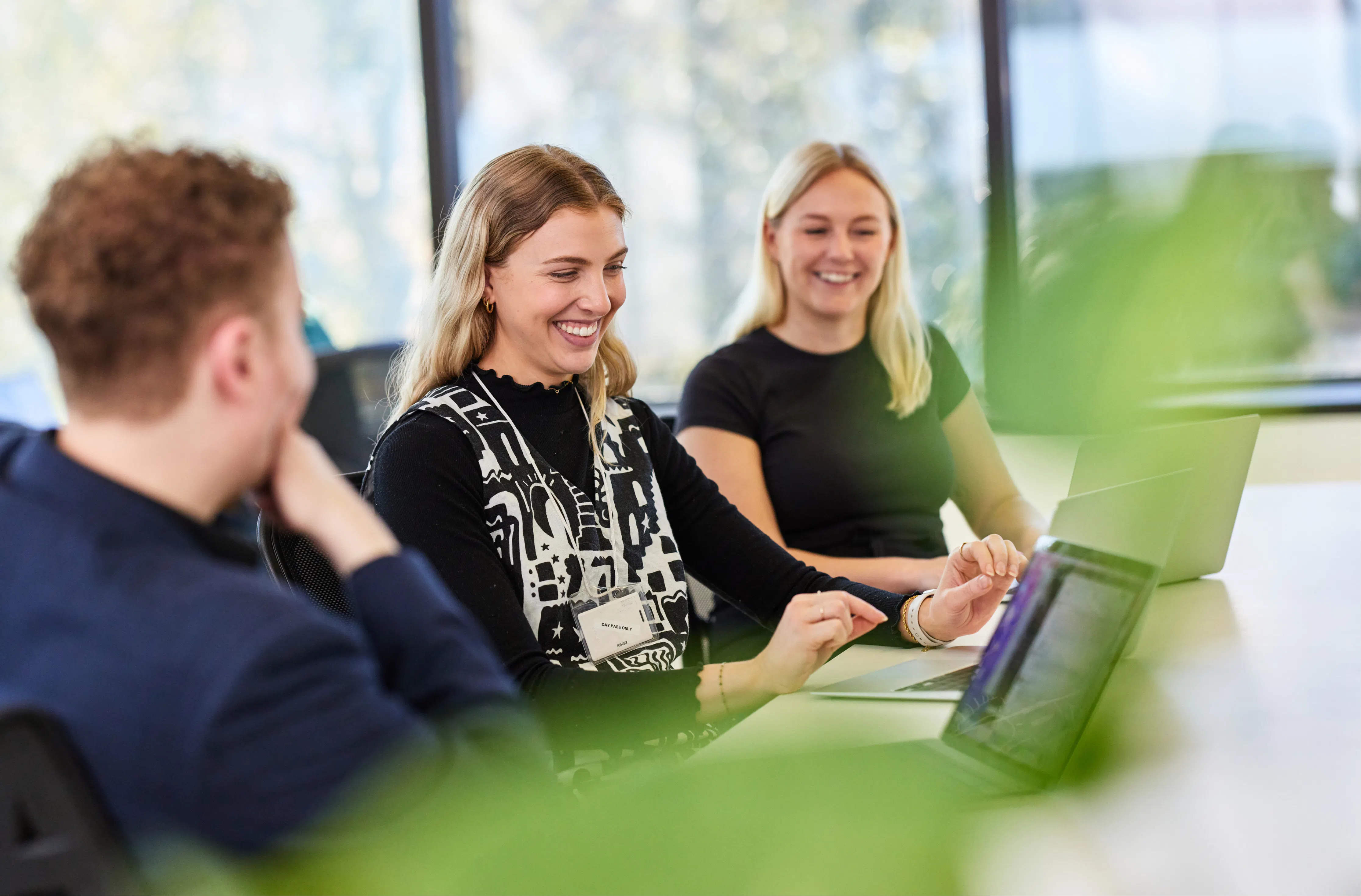 Members of the Hireup for Providers team working at their desks.