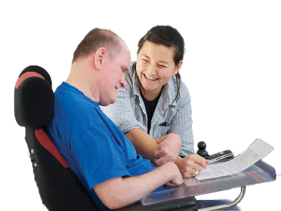 A support worker and a person with disability.