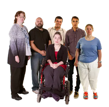 A group of people standing together. They have different disabilities.