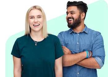 Two Hireup support workers standing side by side, smiling