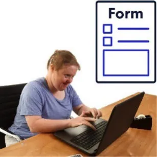A woman filling out a form on a computer.