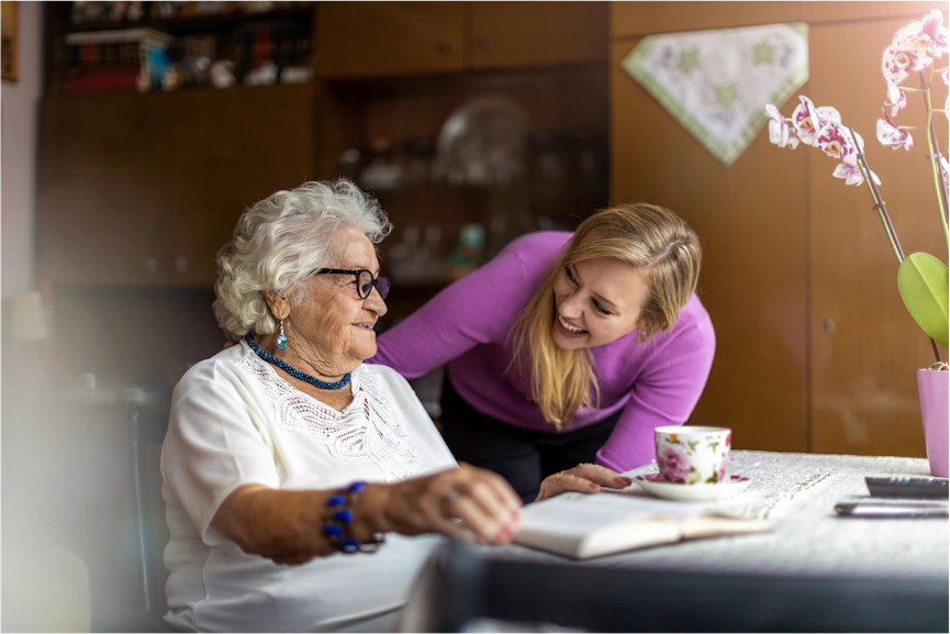 A support worker assisting a client at home.