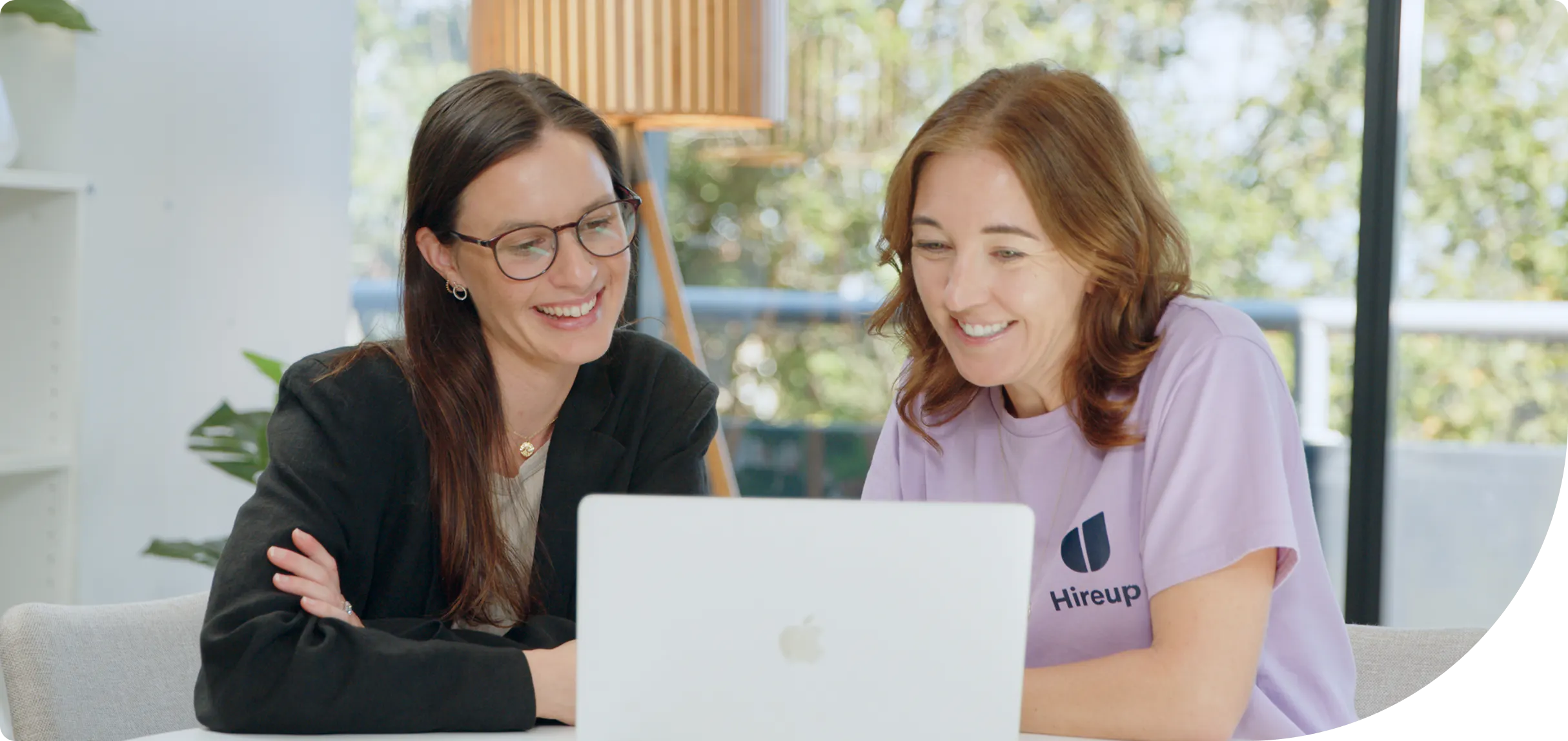 The Hireup Aged Care Team working at their computers.