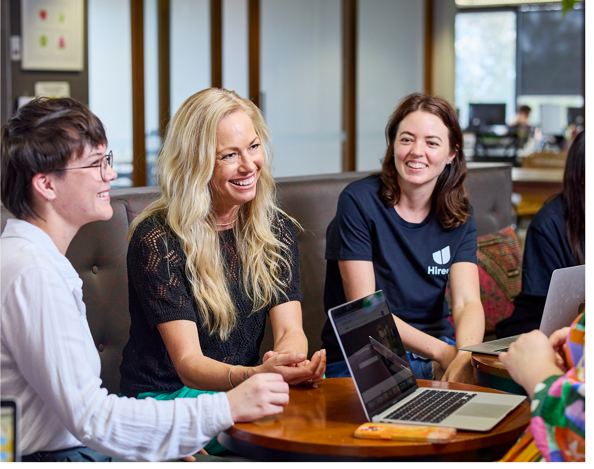 Staff from Hireup head office chatting during a webinar.