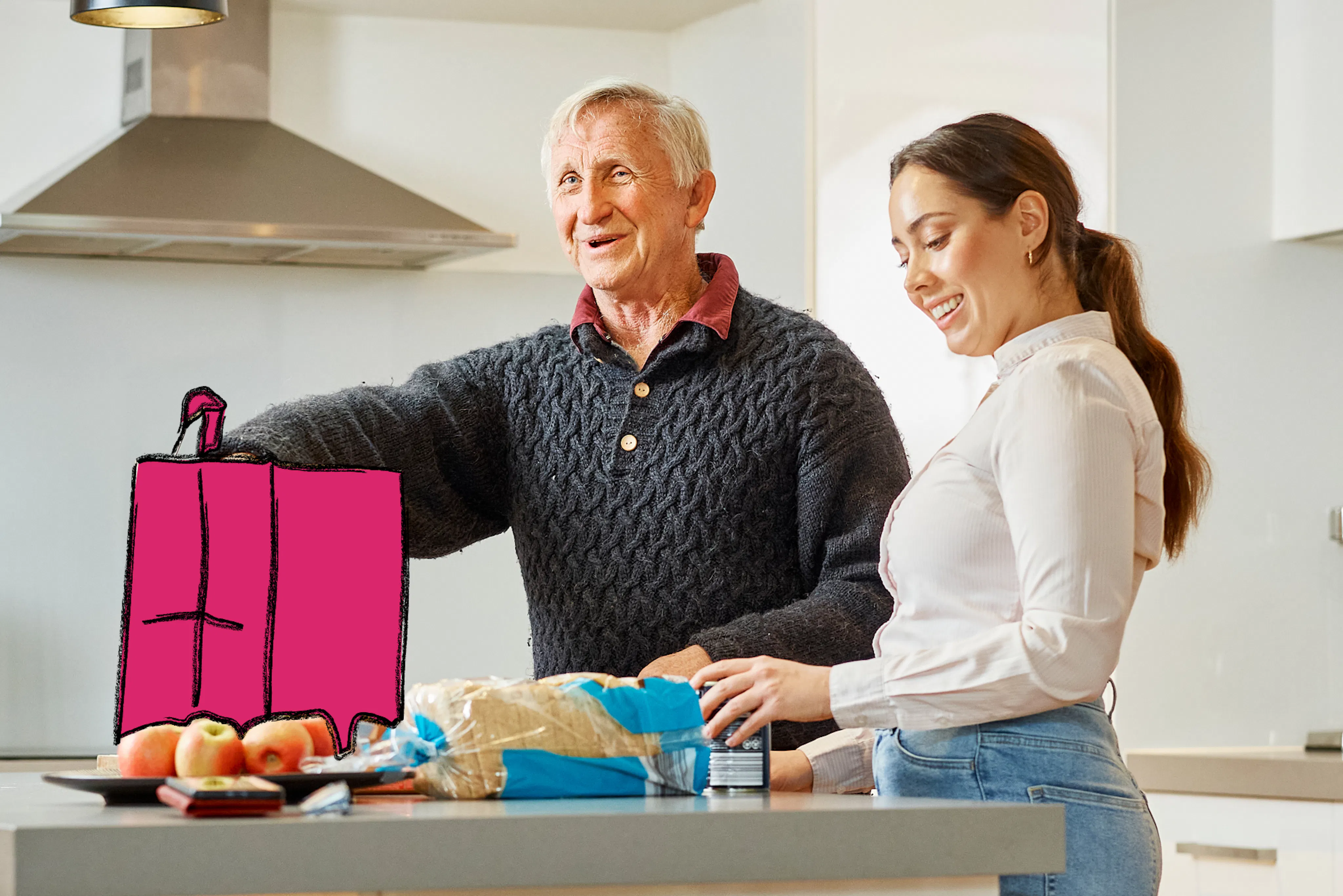 Hireup client Dirk and support worker Brenda unpack groceries on his kitchen bench.