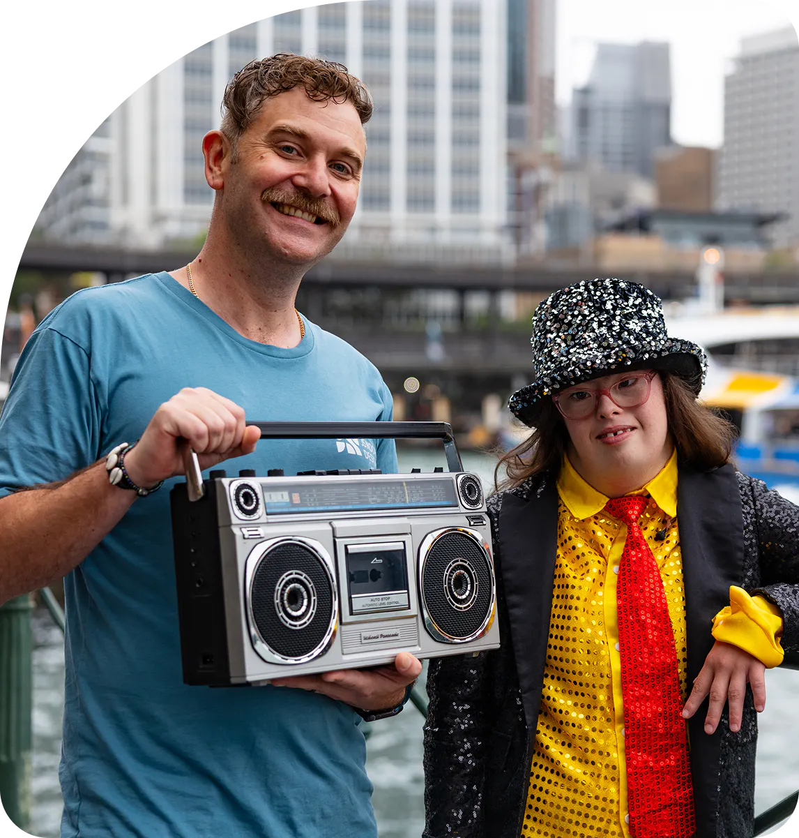 Hireup client Caoimhe busking in Sydney  with her support worker Dyllan.