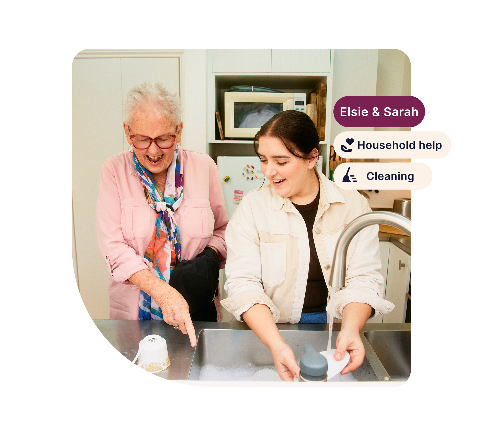Support worker Sarah helps aged care client Elsie with the dishes. There are three tags on the right side: "Elsie and Sarah", "Household help" and "Cleaning". 