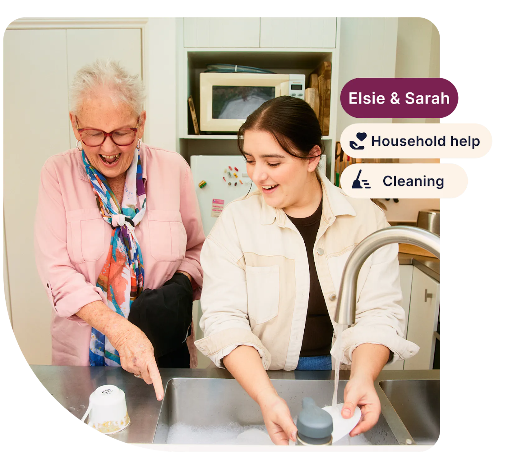 Support worker Sarah helps aged care client Elsie with the dishes. There are three tags on the right side: "Elsie and Sarah", "Household help" and "Cleaning".