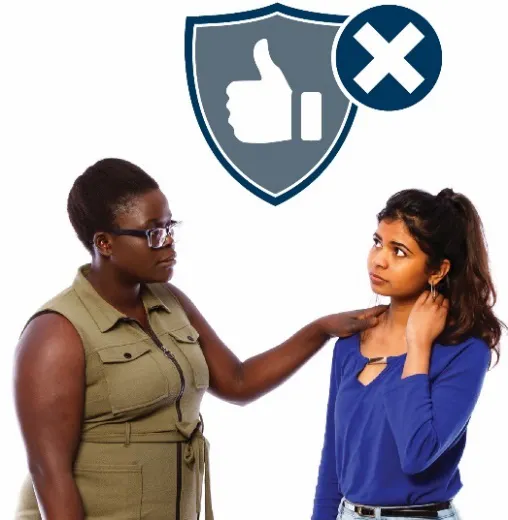 A woman supporting another with her hand on the other woman shoulder. There is a safely icon with a cross above them
