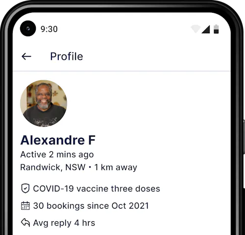 An Android phone showing a support worker's profile on the Hireup app.