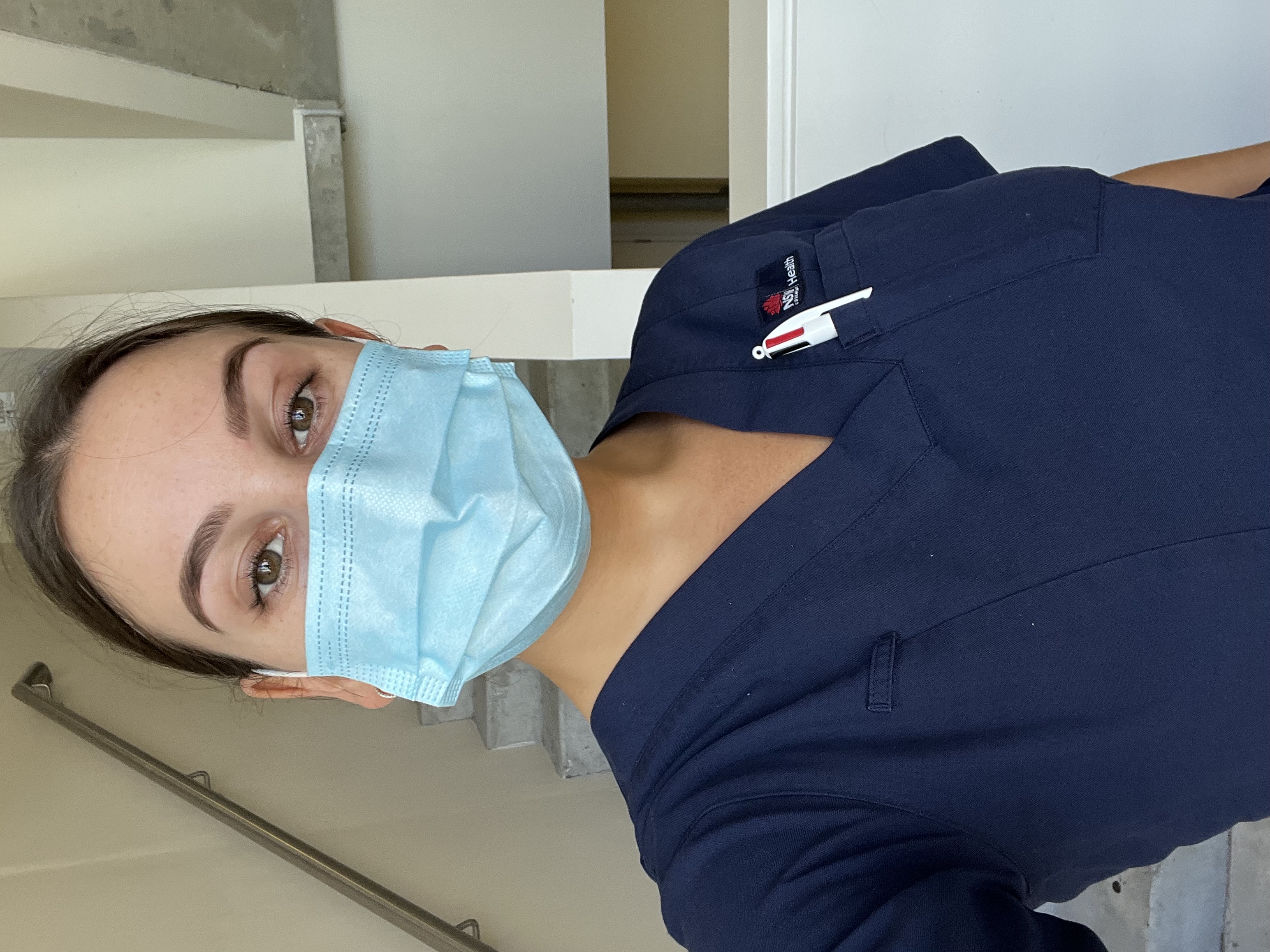 Image shows Hireup in-house nurse, Tori Morris, in hospital scrubs in her previous job in a hospital.