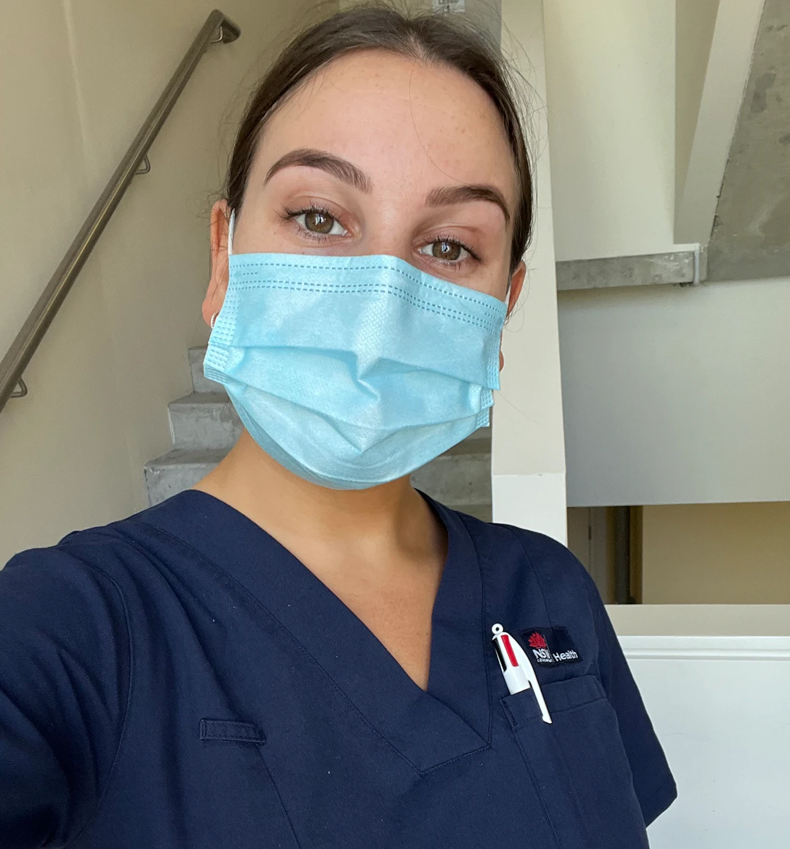 Image shows Hireup in-house nurse, Tori Morris, in hospital scrubs in her previous job in a hospital.