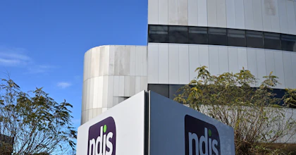 Exterior of NDIS building with an NDIS sign in the foreground.