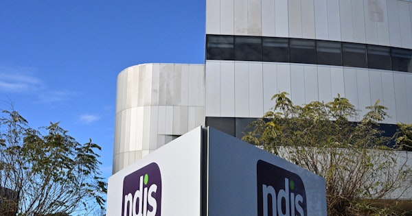Exterior of NDIS building with an NDIS sign in the foreground.
