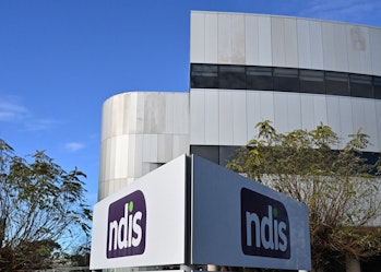 Image shows: Exterior of NDIS building with an NDIS sign in the foreground.