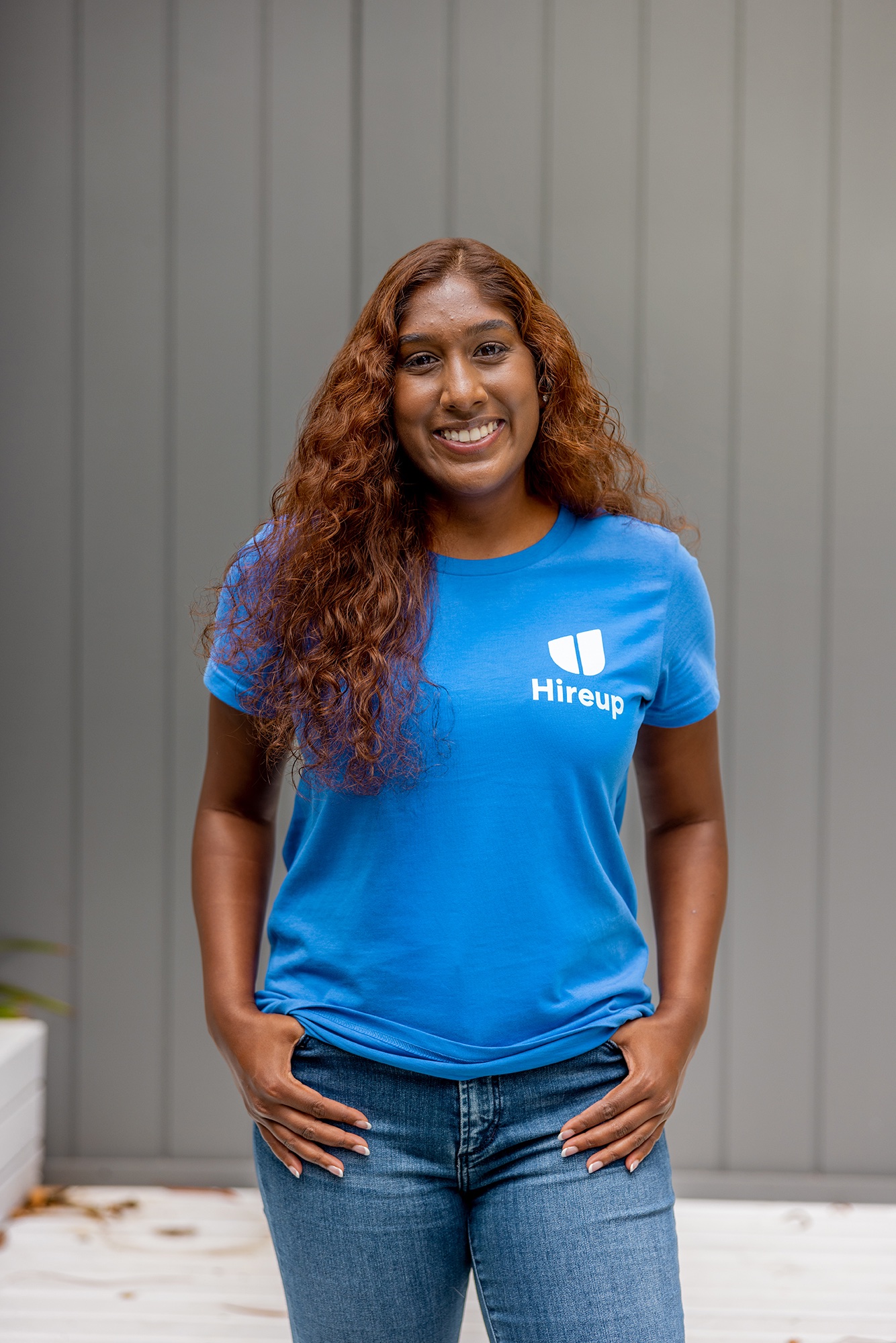 Hireup support worker Brenna smiling at the camera.