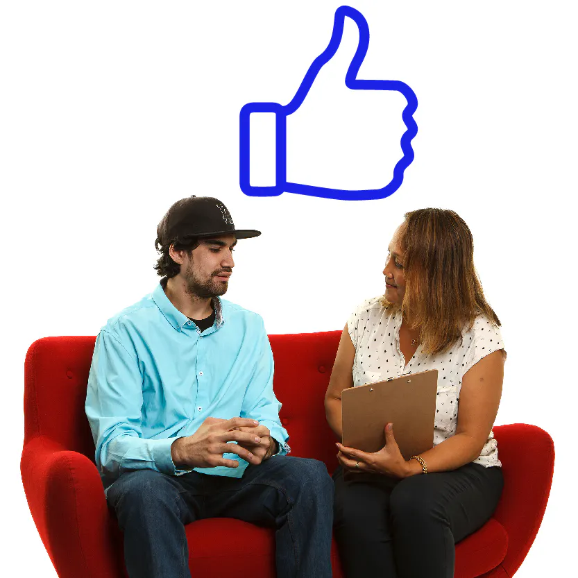 A thumbs up next to a person having a conversation with a support worker.