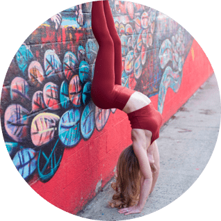 Doing Yoga near statue