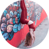 Doing Yoga near statue