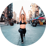 Doing Yoga near statue