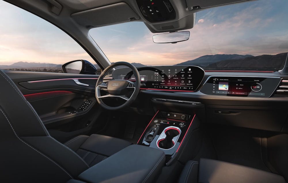 Beleuchtetes Cockpit mit Touchscreens im Audi A6