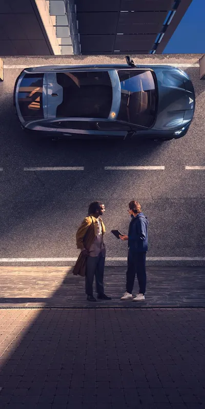 Zwei Menschen stehen neben einem CUPRA Tavascan