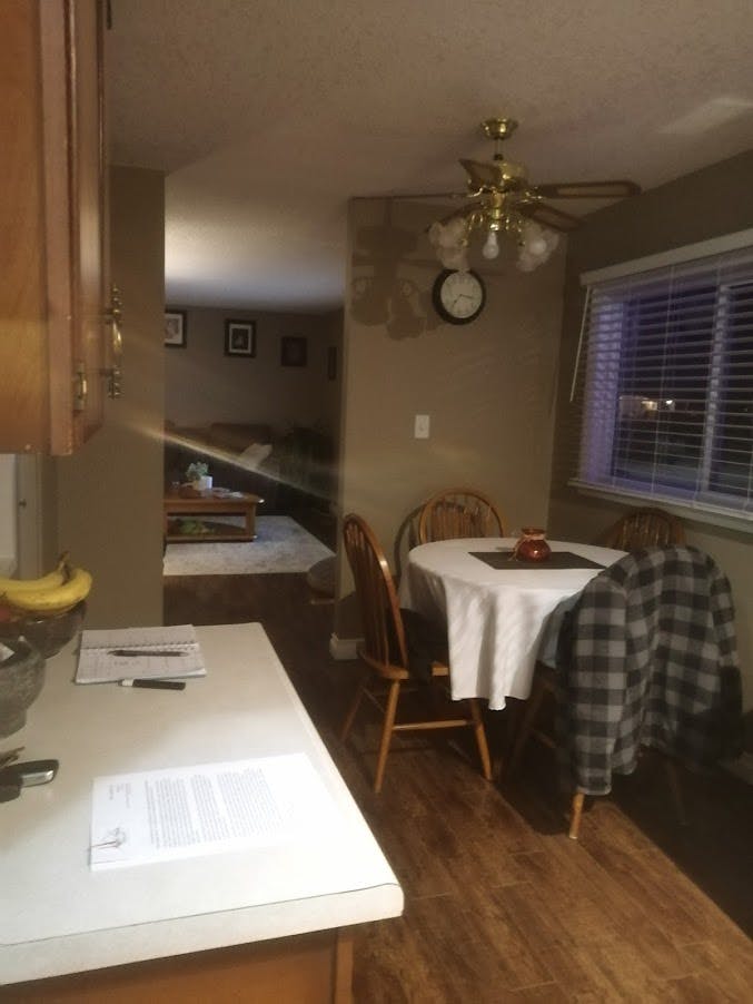 Cramped dining room with closed in walls