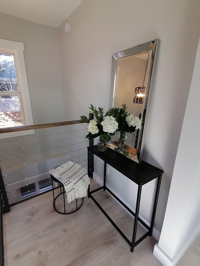 Entry way of modern stairway with wire frame