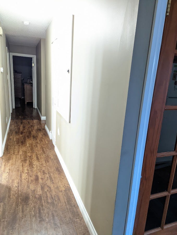 Tight hallway with laminate flooring
