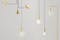 Goudkleurige lampen in minimalistisch design